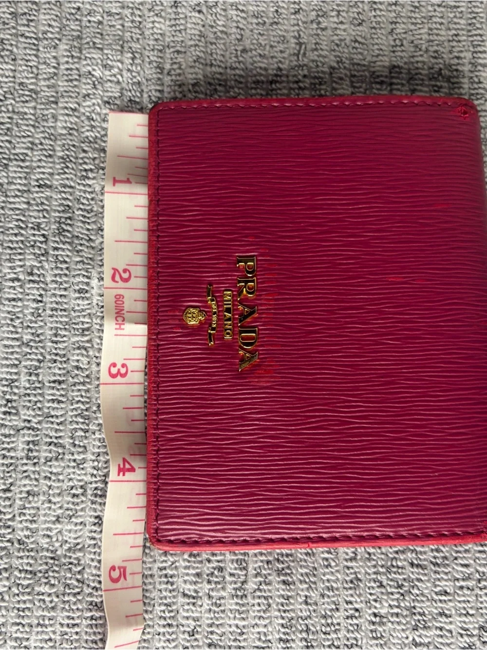 Authentic Prada Saffiano Leather Compact Wallet in deep red/berry/magenta color